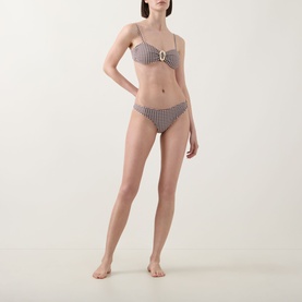 Model wearing Away That Day Cabo Verde Gingham Bikini Bottoms in espresso and ivory gingham, low-rise Brazilian cut, paired with matching bikini top
