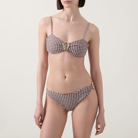 Model wearing Away That Day Cabo Verde Gingham Bikini Bottoms in espresso and ivory gingham, low-rise with gold-tone ring detail, styled with