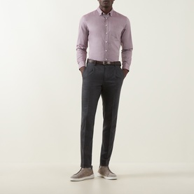 Model wearing Bugatti Soft Oxford Shirt in Blackberry with button-down collar, styled with charcoal trousers and grey slip-on shoes.