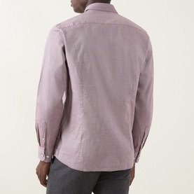 Model wearing Bugatti Soft Oxford Shirt in Blackberry, rear view showing dropped shoulders, long sleeves, and curved hem in 100% cotton.