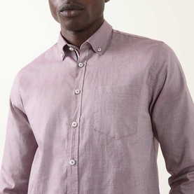 Model wearing Bugatti Soft Oxford Shirt in Blackberry, featuring button-down collar, chest patch pocket, and long sleeves in 100% cotton.