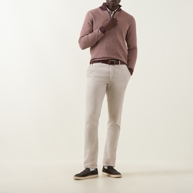 Model wearing Bugatti Textured Half-Zip Sweater in Blackberry with cream trousers, brown belt, and dark navy loafers.