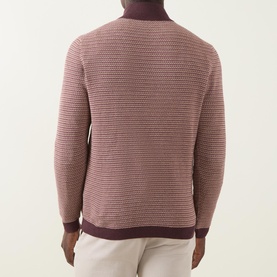 Model wearing Bugatti Textured Half-Zip Sweater in Blackberry, showing back view with textured knit finish and contrasting ribbed trims. Styled with