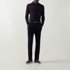 Model wearing Bugatti blackberry sweatshirt with navy trousers, brown belt, and grey trainers.