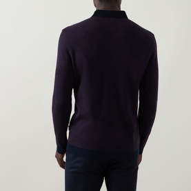 Model wearing Bugatti blackberry long-sleeve polo sweatshirt, back view, styled with navy trousers.