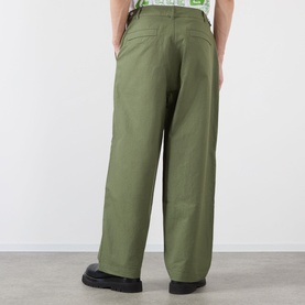 Model wearing Emporium Ripstop Fatigue Wide Leg Denim Trousers in green, wide-leg silhouette, back view, styled with black shoes.