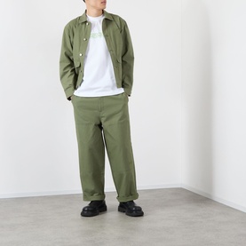 Model wearing Emporium Ripstop Fatigue Wide Leg Denim Trousers in green, styled with matching olive shirt jacket and white tee.