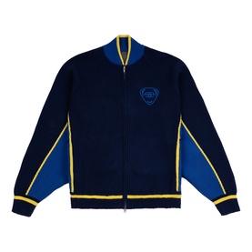 Emporium navy knitted zip-up bomber jacket with royal blue panelling, yellow trim detailing, and shield logo badge on chest