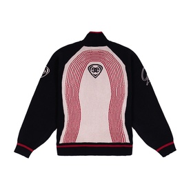 Emporium navy knit bomber jacket, back view, with pink wave pattern panel, red trim, and embroidered logo detail