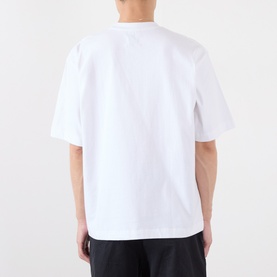 Model wearing Emporium Armour Logo T-Shirt in white, rear view showing oversized fit and short sleeves in heavyweight cotton.