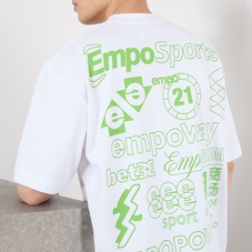 Model wearing Emporium There'll Be Signs Logo T-Shirt in white, rear view showing all-over green logo screenprint graphics.