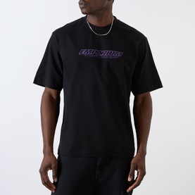 Model wearing Emporium There'll Be Signs Logo T-Shirt in black with purple front graphic print, crew neck, short sleeves, styled with silver chain