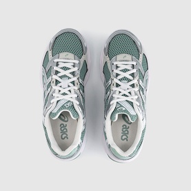 Asics trainers in Verdigris and Pure Silver, overhead view showing teal mesh upper, white lacing, and grey midsole.