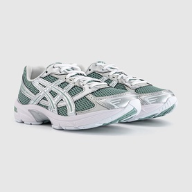 Asics GEL-1130 trainers in Verdigris and Pure Silver, featuring mesh upper, white branding, and chunky white sole.