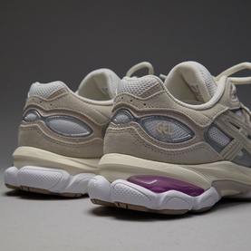 Asics trainers in white and taro purple, suede and mesh upper, chunky white midsole with purple heel accent detail.