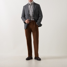 Model wearing Gant black grey blazer with plaid shirt, brown cord trousers and dark leather shoes