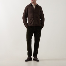 Model wearing Gant Black Brown cotton casual jacket, styled with dark trousers and brown leather shoes.