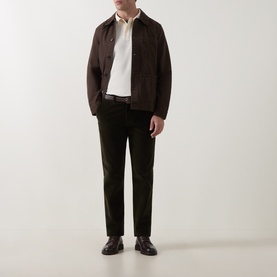Model wearing Gant Black Brown cotton casual jacket, styled with white shirt, dark trousers and brown leather loafers.
