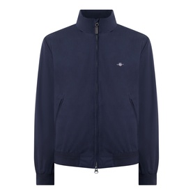Gant Hampshire Shield Logo Jacket in Evening Blue, zip-through casual jacket with stand collar, ribbed trims and chest Shield logo