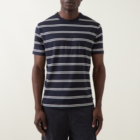 Model wearing Gant Pima Striped T-Shirt in Evening Blue with white horizontal stripes, crew neck, and short sleeves.