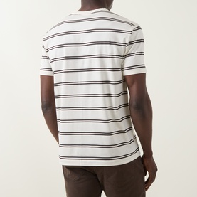 Model wearing Gant Crew Neck T in cream with navy horizontal stripes, back view, styled with brown trousers.