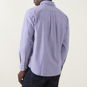 Model wearing Gant Crisp Blue striped cotton regular fit shirt, rear view, styled with dark denim jeans