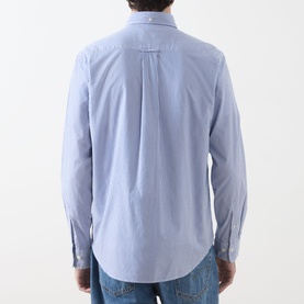 Model wearing Gant Classic Stripe Banker Shirt in College Blue, rear view showing box pleat, locker loop, curved hem, paired with blue jeans.