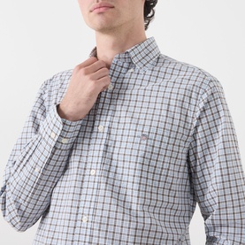 Model wearing Gant Classic Check Logo Shirt in Faded Taupe, button-down collar, chest pocket, long sleeves, check pattern