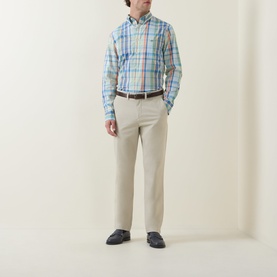 Model wearing Gant Shield Logo Checked Casual Shirt in Misty Mint multicolour check, styled with beige trousers and brown belt.