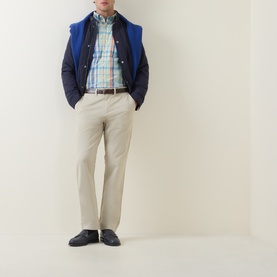 Model wearing Gant Shield Logo Checked Casual Shirt in Misty Mint, styled with navy quilted gilet, stone chinos and dark loafers.