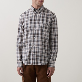 Model wearing Gant sand check regular fit casual shirt with button-down collar, styled with brown trousers.
