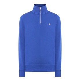 Gant Crisp Blue half-zip sweatshirt with funnel neck, silver-tone zip, and small logo badge on chest