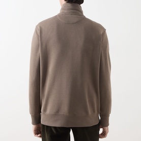 Model wearing Gant faded taupe half-zip sweatshirt, back view, ribbed cuffs and hem, high collar