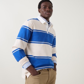 Model wearing Gant Nautical Blue striped cotton sweatshirt with collar detail, styled with chinos and a collared shirt underneath