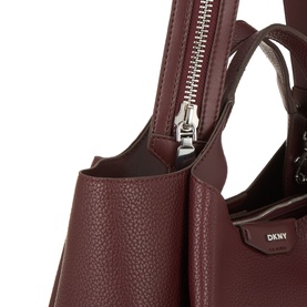 DKNY Willa Logo Satchel in Aged Wine with silver-toned hardware, showing zip detail and faux grained finish close-up
