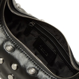 DKNY black shoulder bag interior view, silver-tone studs on exterior, zip closure, black branded lining with card slots visible