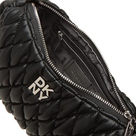 DKNY Remy Quilted Shoulder Bag in black, open top zip showing interior, silver-tone hardware and logo lettering detail visible