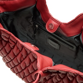 DKNY Paula Quilted Medium Tote Bag in Rhythm Red, open interior view showing black lining, zip pocket and magnetic snap fastening