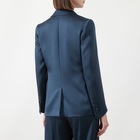 Model wearing a teal blue satin blazer, back view, styled with matching wide-leg trousers