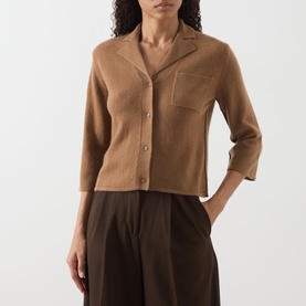 Model wearing Marella Alpaca Knitted Polo Cardigan in camel, with notch lapel collar, three-quarter sleeves and chest pocket, styled with dark
