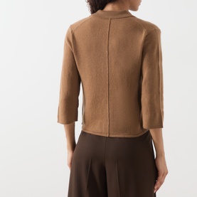 Model wearing Marella Alpaca Knitted Polo Cardigan in camel, back view showing cropped length, three-quarter sleeves and brushed knit finish