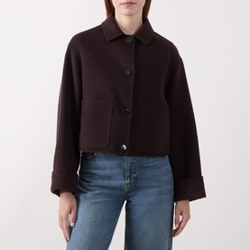 Model wearing Marella brown wool-blend cropped coat with collar, front pockets and button fastening, styled with blue jeans.