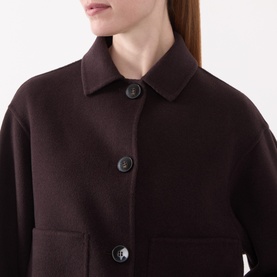Model wearing Marella brown wool blend coat with shirt collar, button front fastening and patch pocket detail visible.