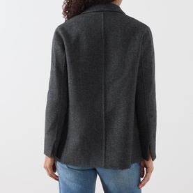 Model wearing Marella melange dark wool coat, rear view, styled with blue jeans