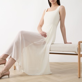 Model wearing Marella Sabine Georgette Dress in Wool White, sleeveless square neck midi with semi-sheer skirt, styled with nude heeled sandals