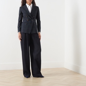 Model wearing Marella navy check double-breasted blazer jacket, styled with matching wide-leg trousers and a white shirt.