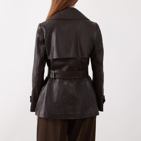 Model wearing Marella brown leather jacket, rear view, featuring wide lapels, belted waist, and double-breasted front detail