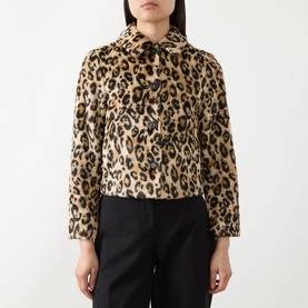 Model wearing Marella Angel Leopard Faux Fur Jacket in camel spotted with flat collar and button fastening, styled with black trousers.