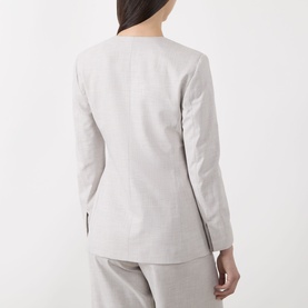 Model wearing Marella Facella Tie-Front Blazer in light grey, back view showing structured shoulders, long sleeves with split cuffs and frayed satin
