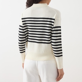 Model wearing Marella cream wool-cashmere striped knit polo top, back view, styled with white trousers